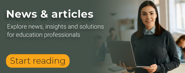 Teach on computer reading news and articles