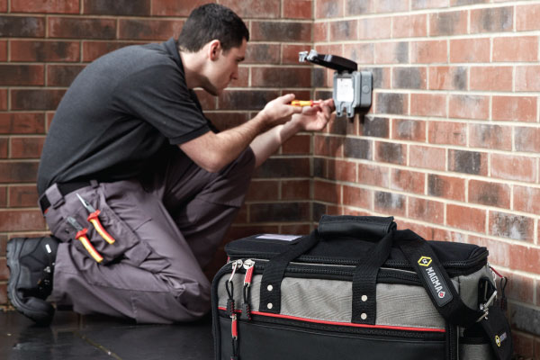 Electrician using an CK screwdriver