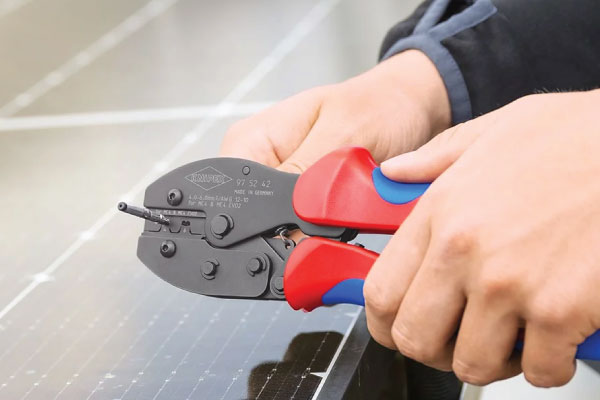 Electrician using Knipex wire strippers