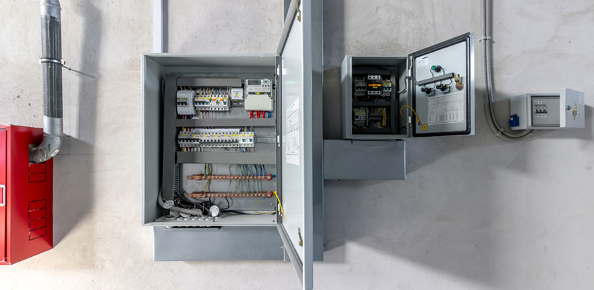 Polycarbonate electronic enclosure protecting control electronics in an industrial manufacturing environment